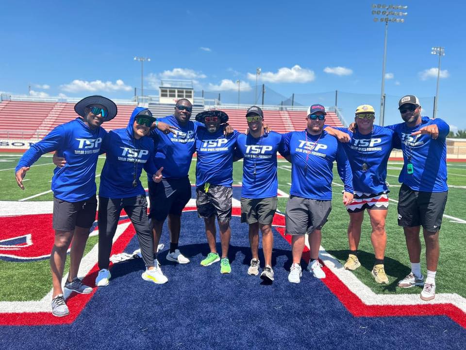 Taylor Sports Performance coaching staff on the field